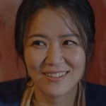 Ji Hyun's boss is portrayed by the Korean actress Jung Seo In (정서인).