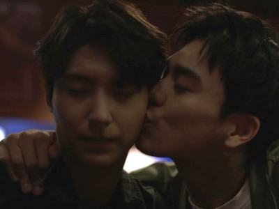Tae Hyung kisses his friend Jae Won.
