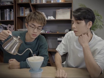 The Cafe Owner and The Boy learn to make coffee together.