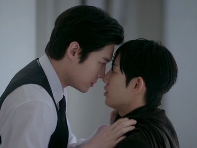 Chaeha and Taeson touch foreheads.