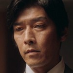 Tanizawa is portrayed by Shingo Murakami (村上新悟).