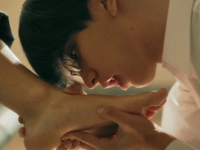 Takaaki licks Naoya's foot.
