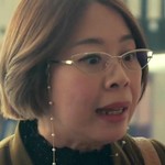 The accountant is portrayed by Thai actress Pong Kusuma Teppharak (กุสุมา เทพรักษ์).