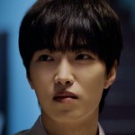 Minwoo is portrayed by a Korean actor.