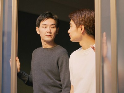 Ryo and Satoru stare at each other.