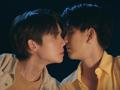 Talay and Puen almost kiss each other.