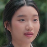 Mew is portrayed by a Thai actress.